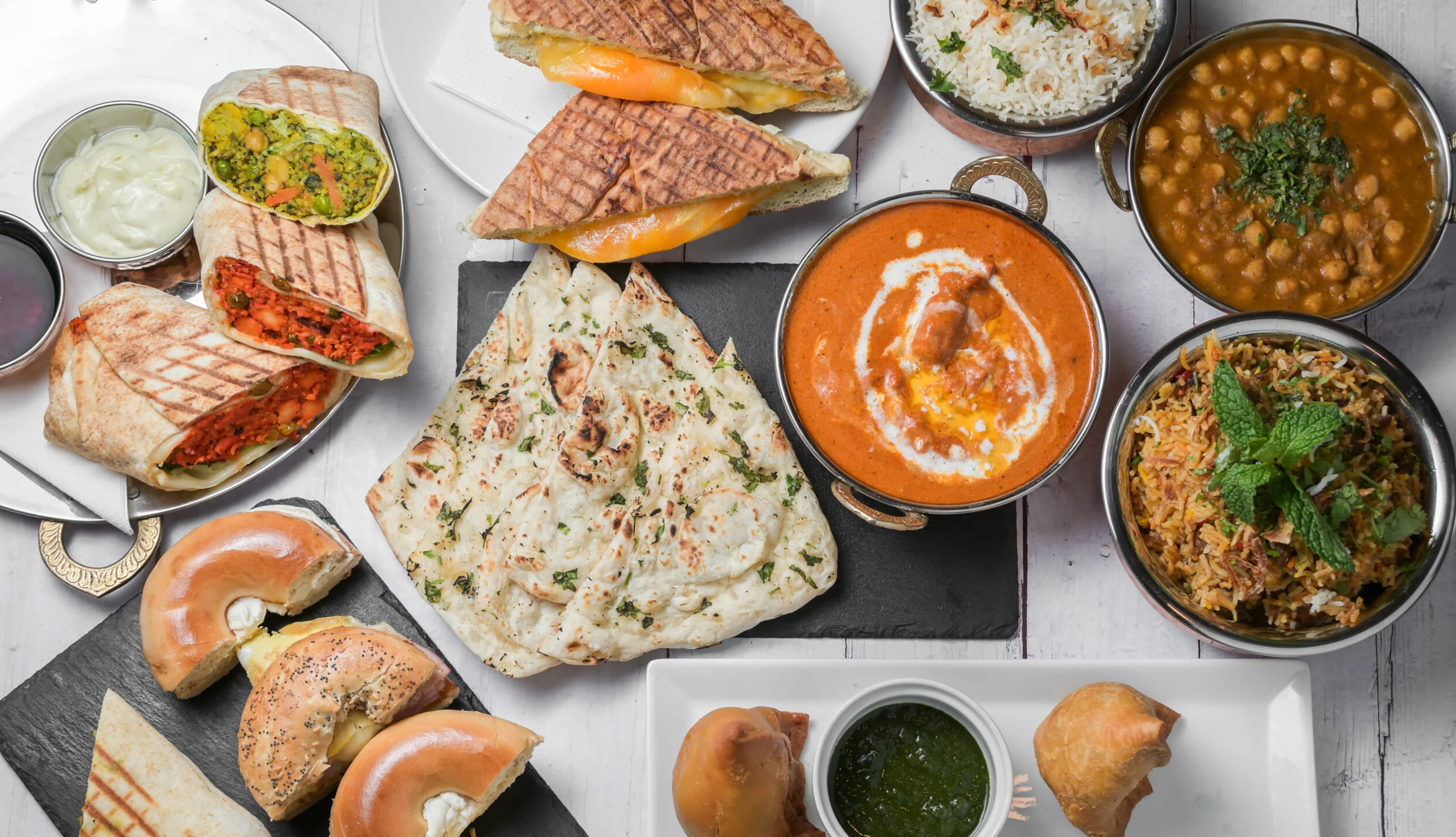 North Indian curries, naan and rice at Hot Mug Cafe, Indian restaurant in West Edmonton, AB