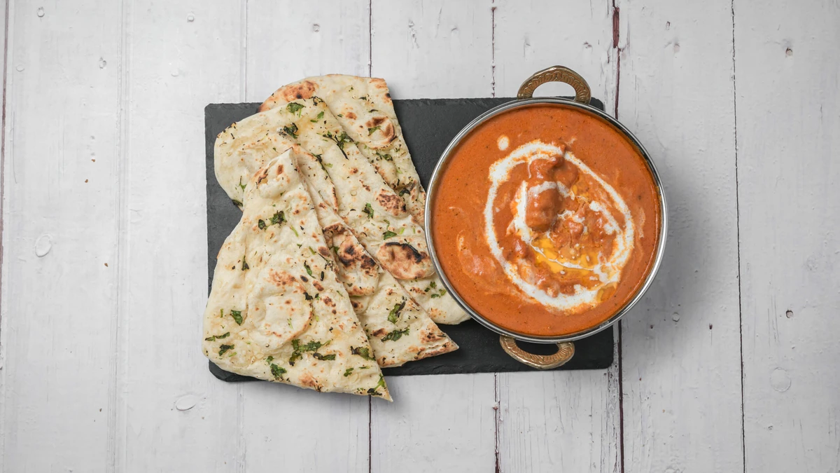 Butter chicken in rich creamy tomato gravy at Hot Mug Cafe, West Edmonton